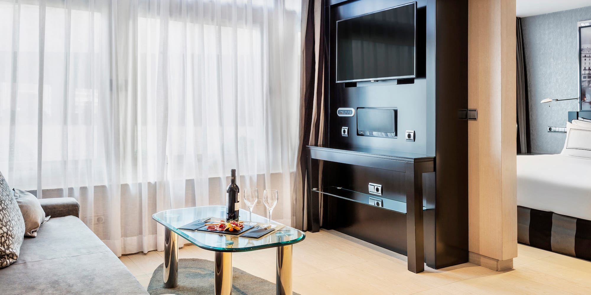 a room with a television and a table