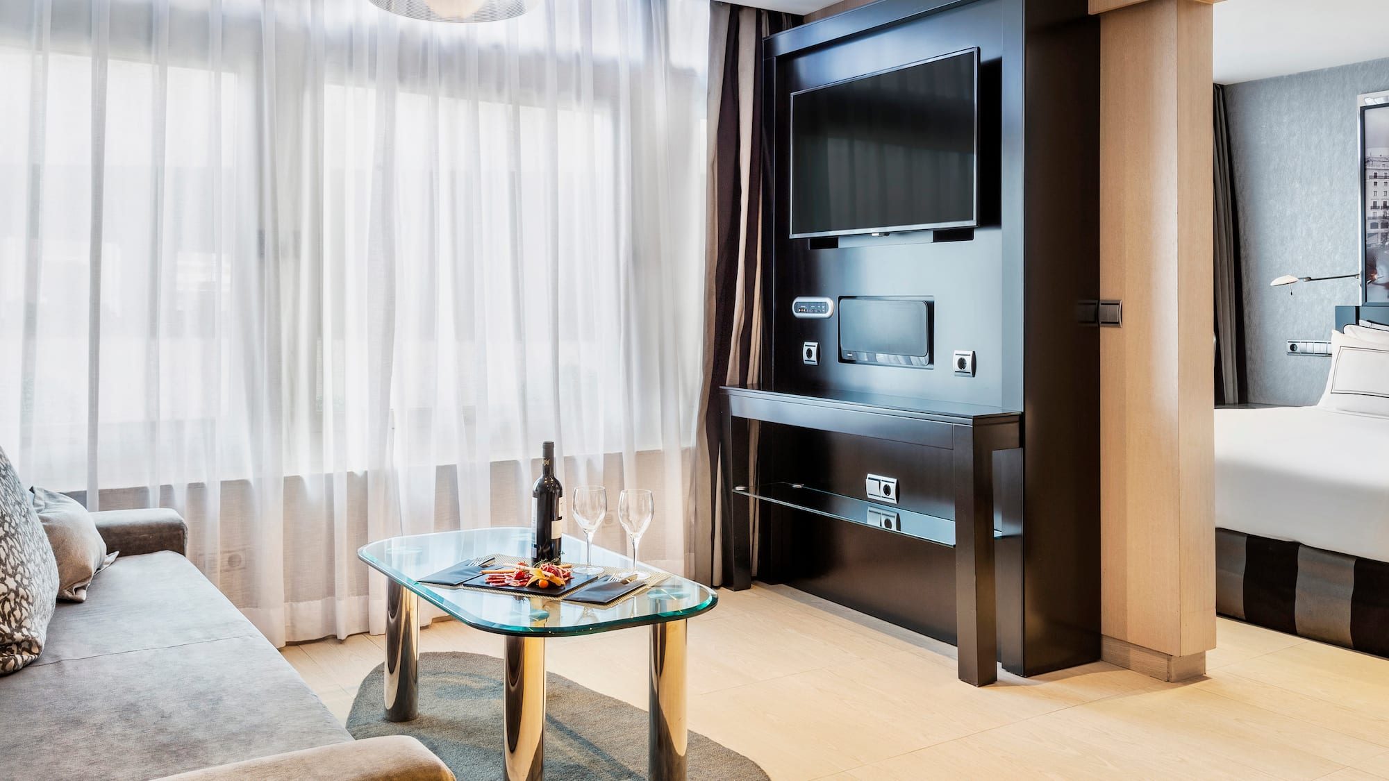 a room with a television and a table