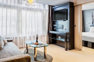 a room with a television and a table