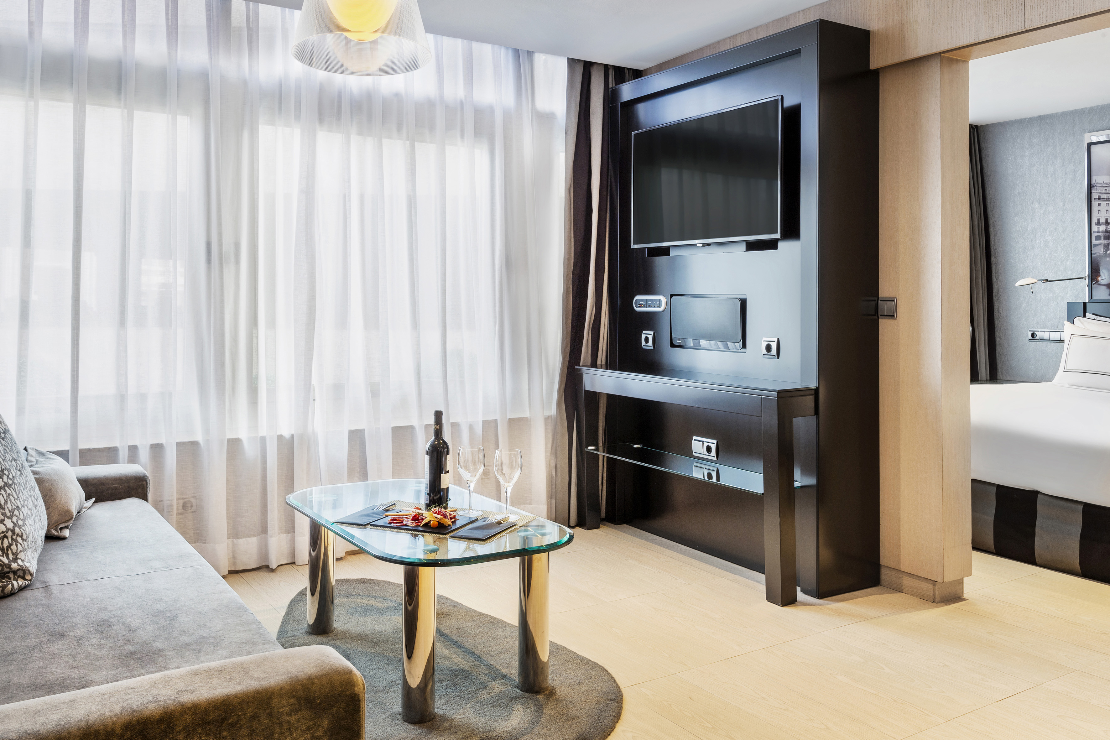 a room with a television and a table