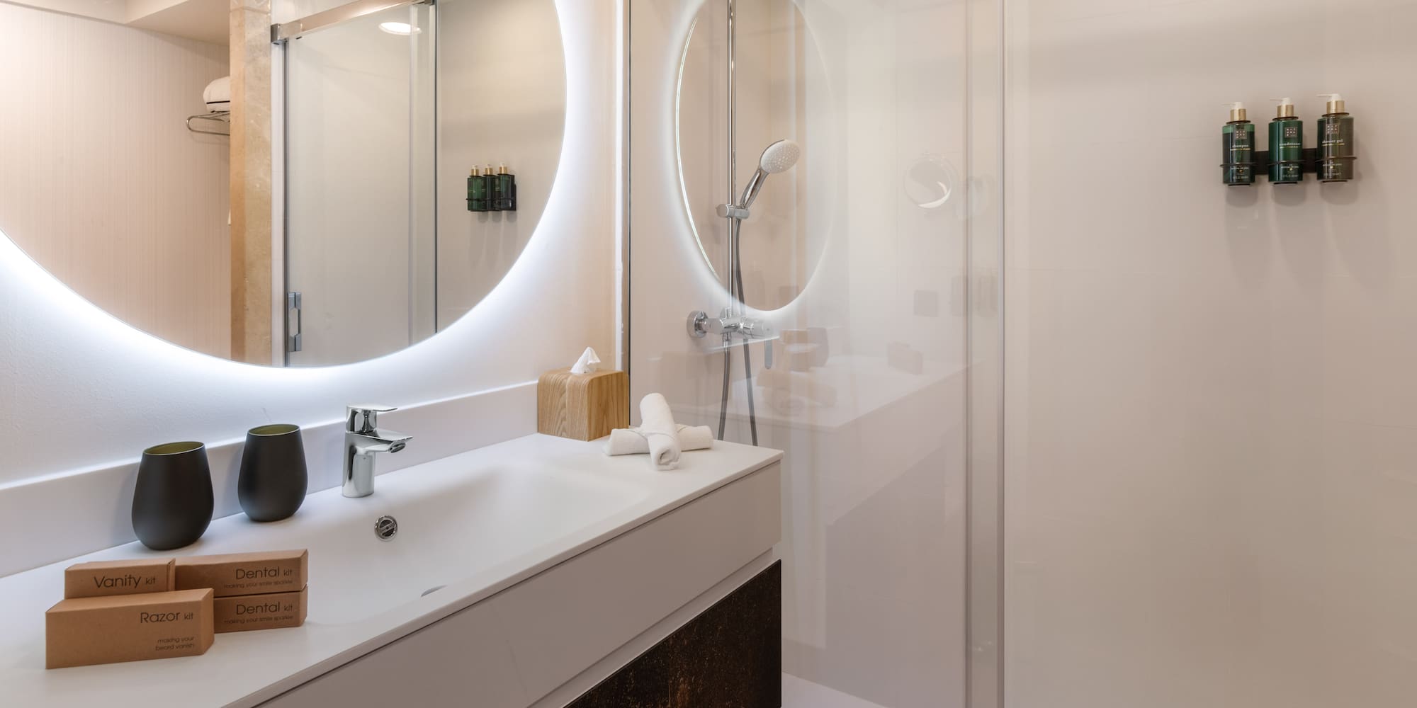 a bathroom with a mirror and sink