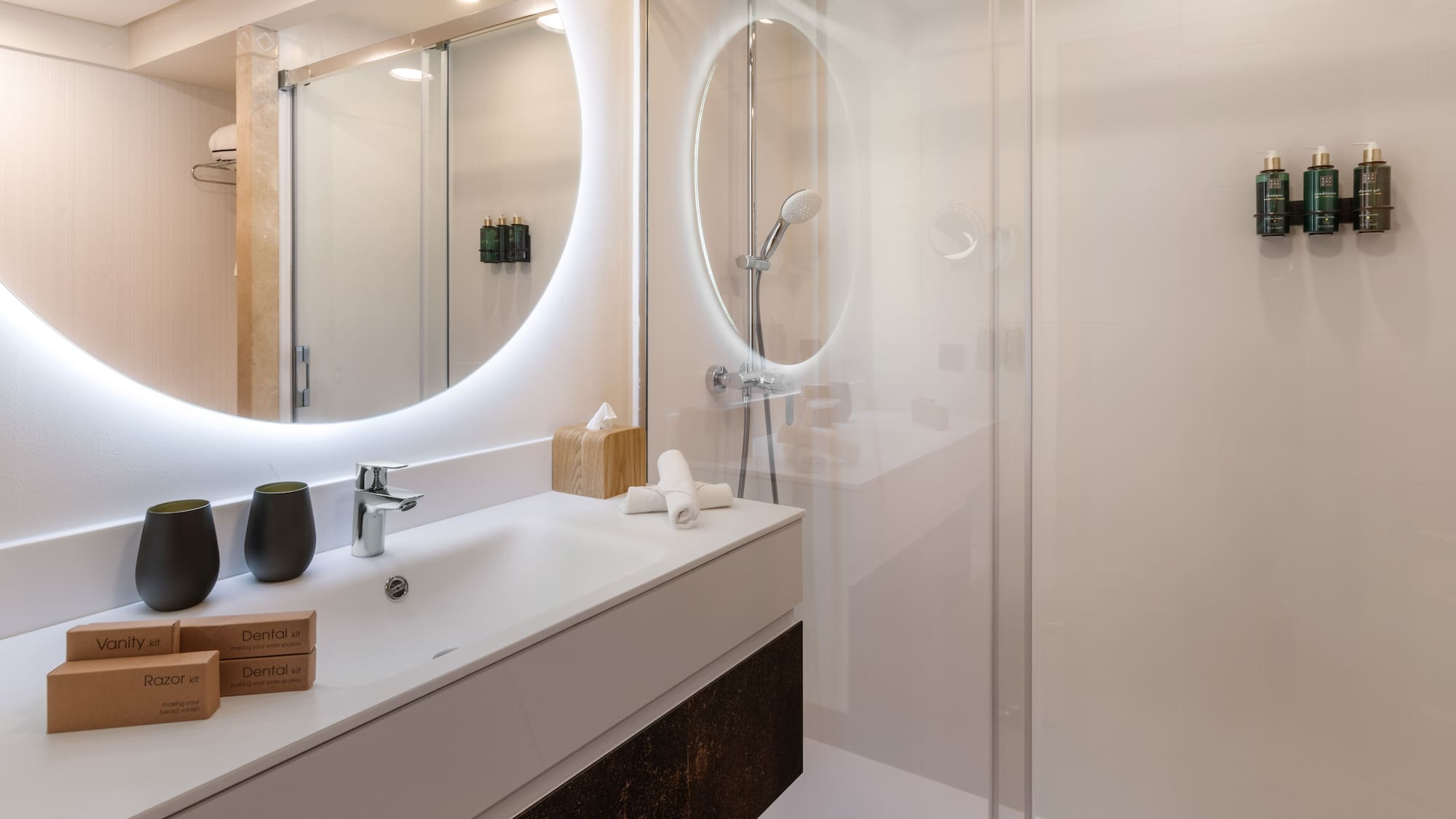 a bathroom with a mirror and sink