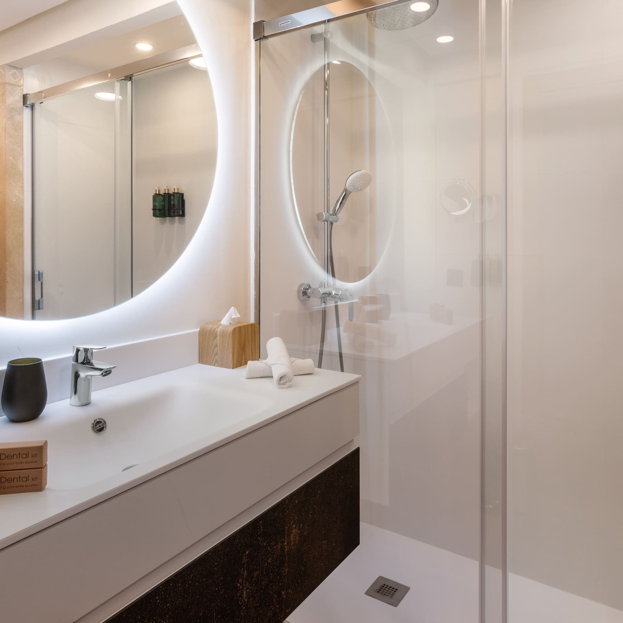 a bathroom with a mirror and sink