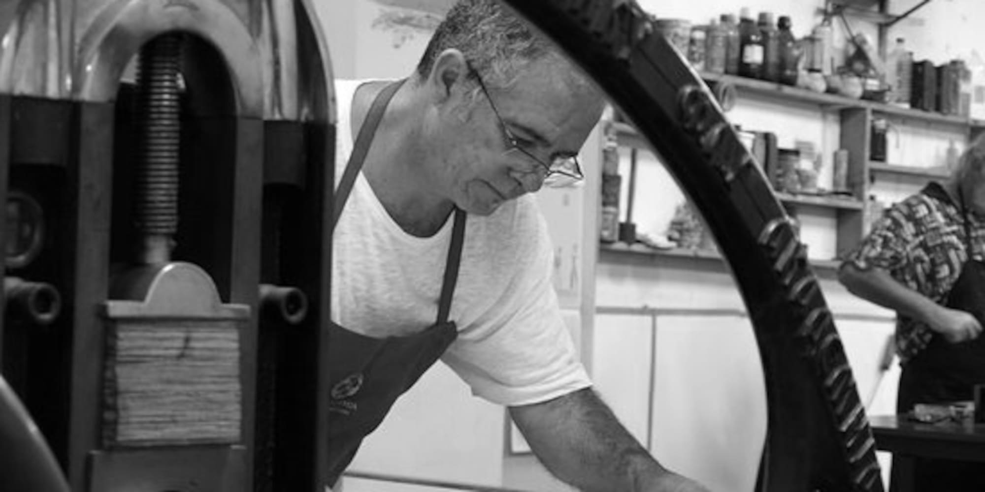 a man working on a piece of paper