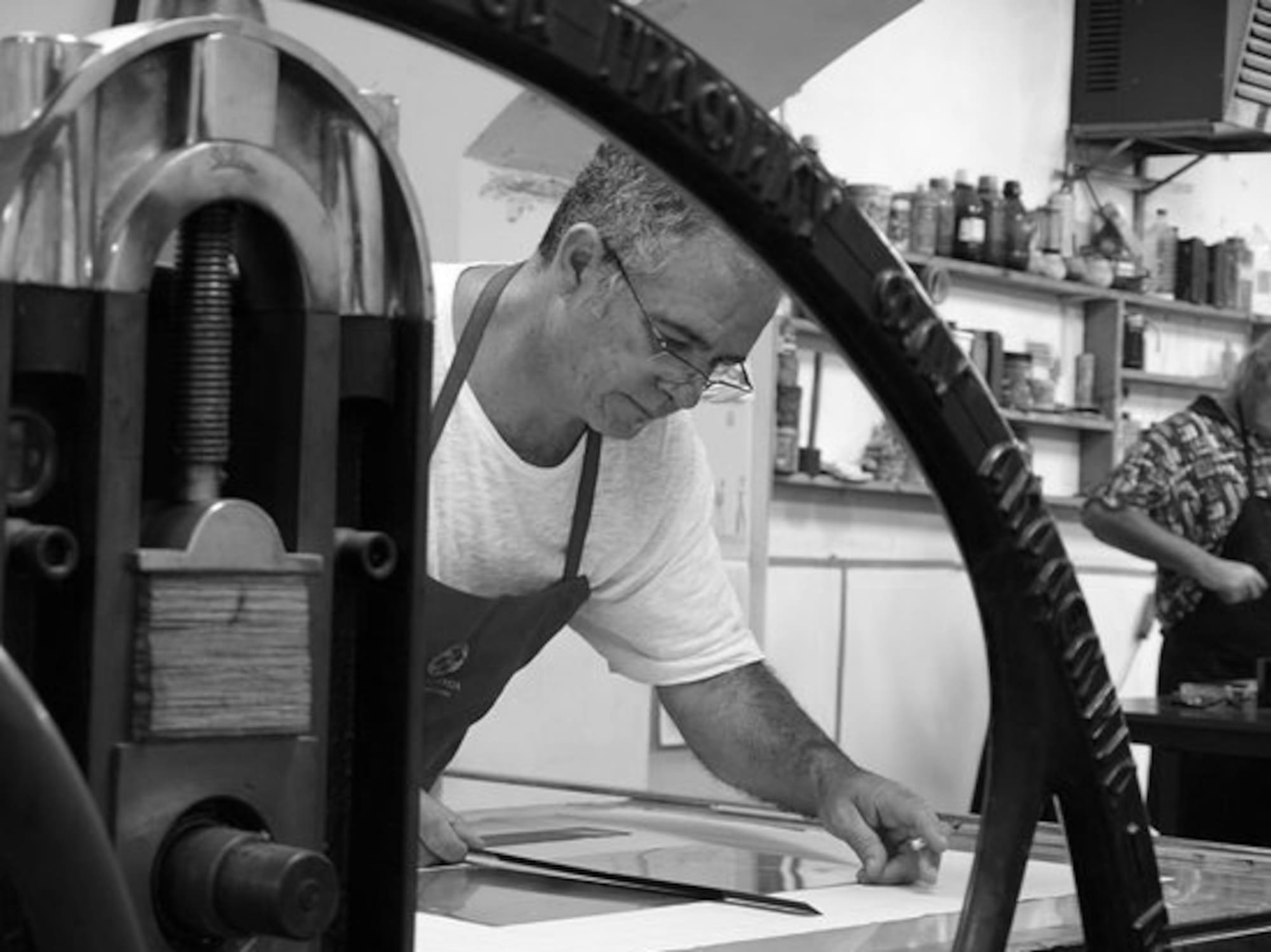 a man working on a piece of paper