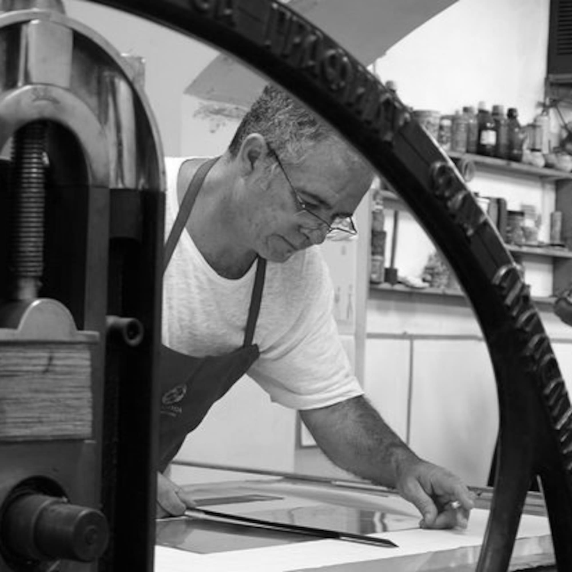 a man working on a piece of paper