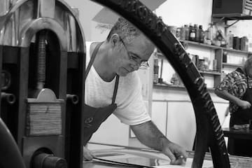 a man working on a piece of paper