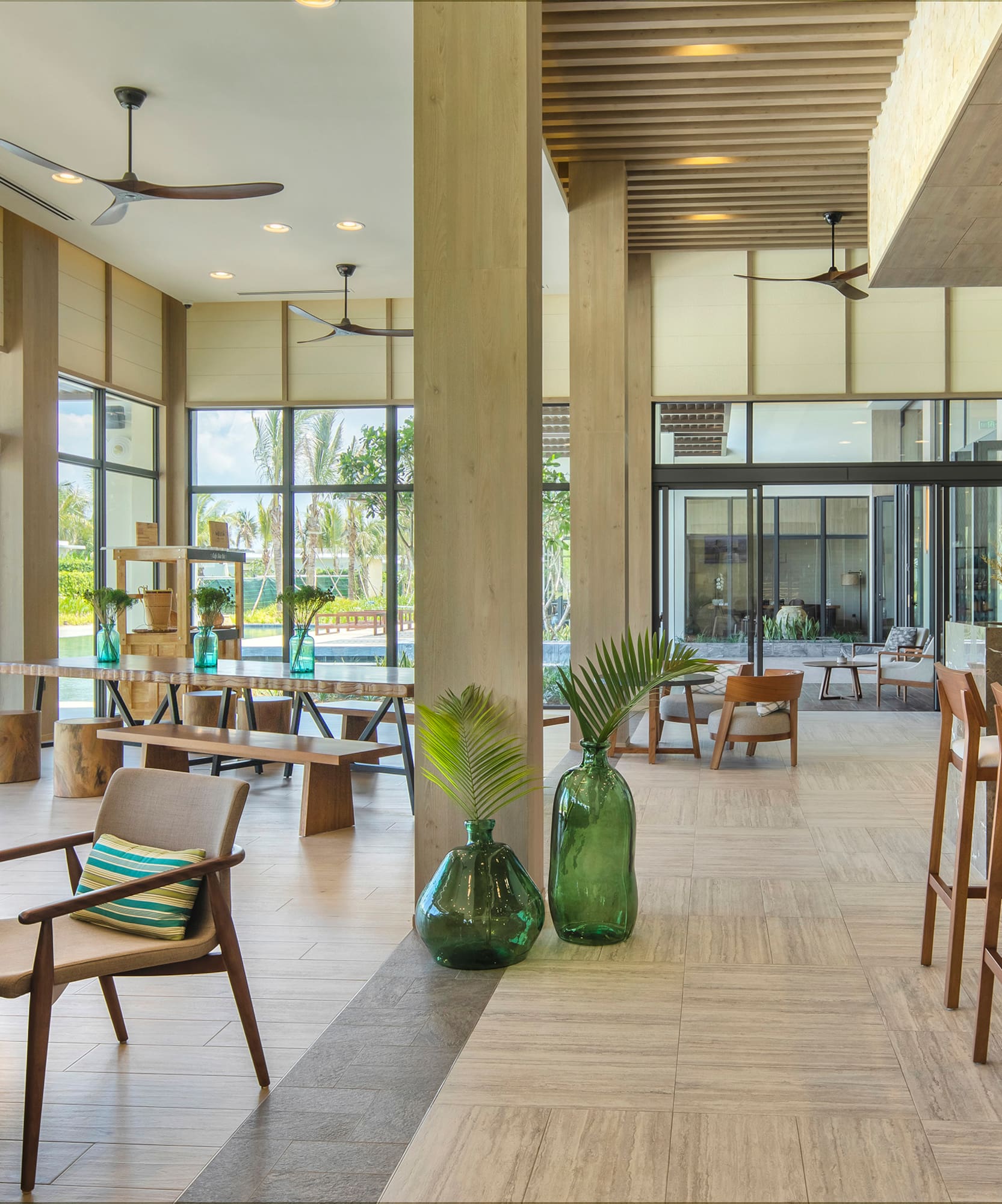 a room with a large glass wall and a large window