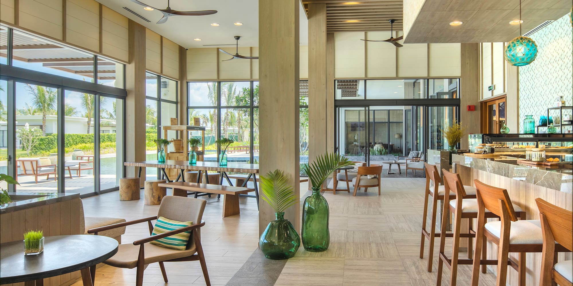 a room with a large glass wall and a large window