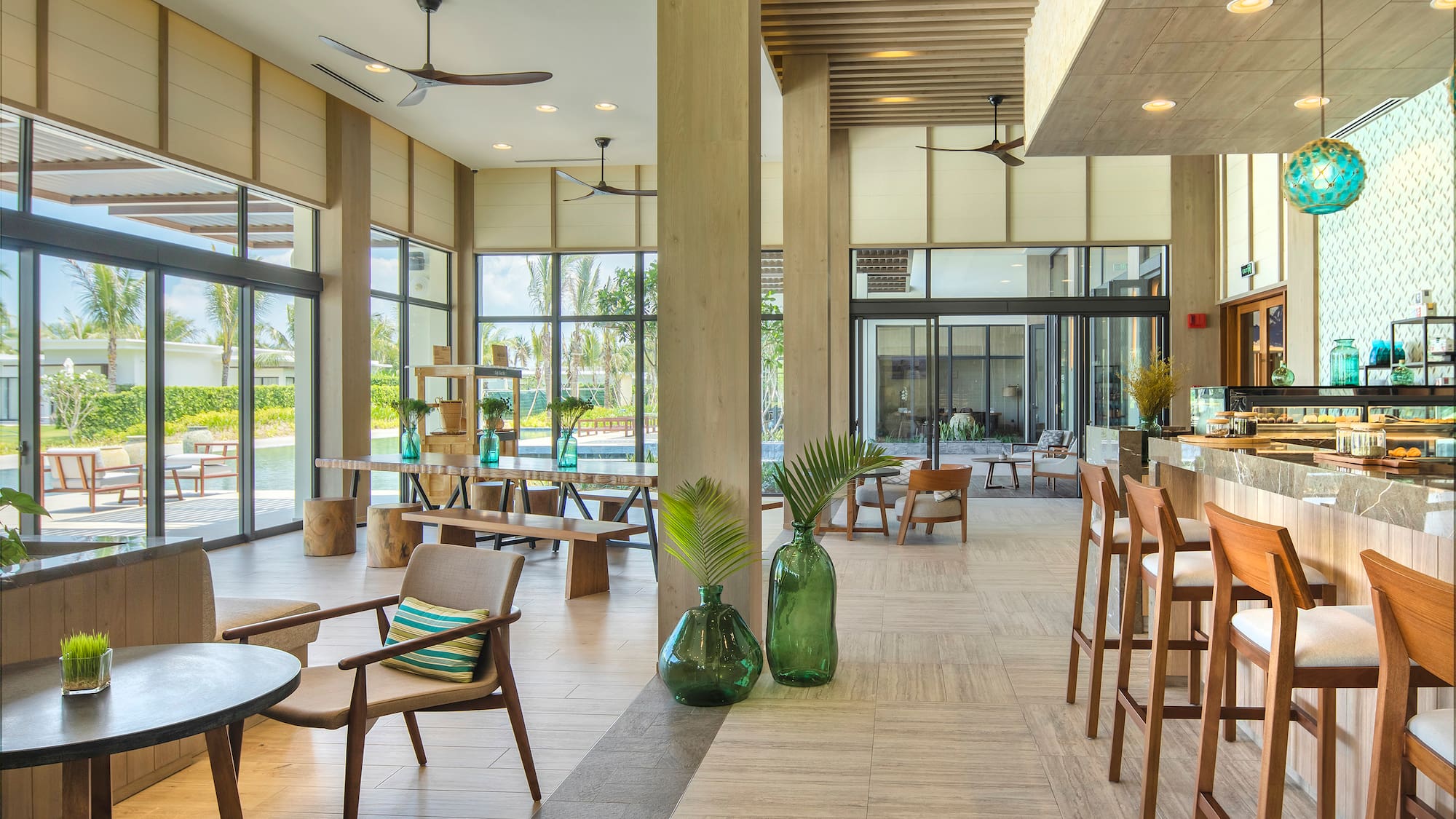 a room with a large glass wall and a large window