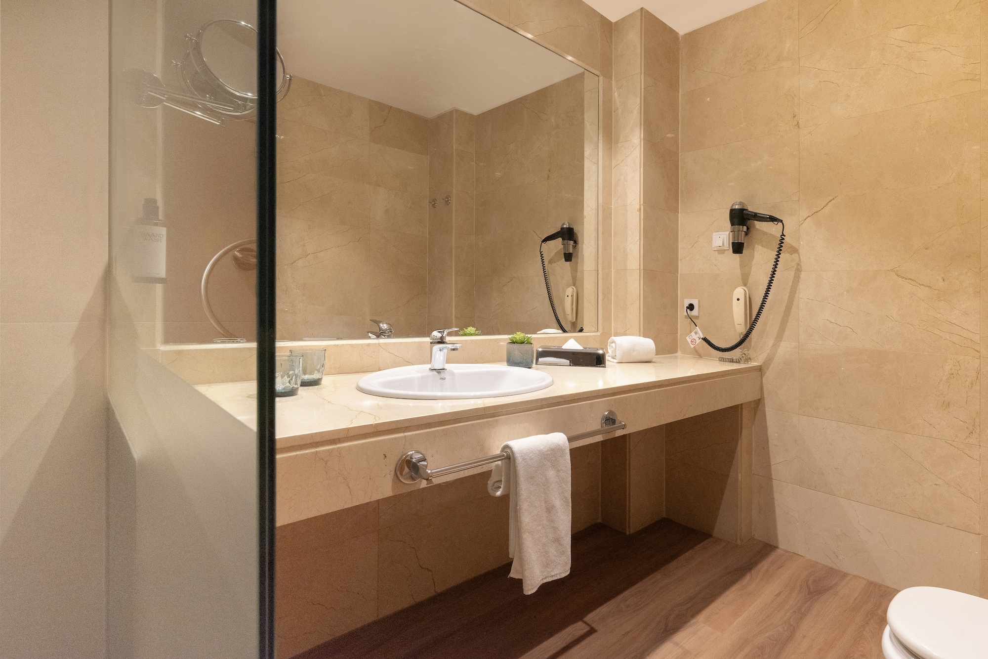 a bathroom with a mirror and sink