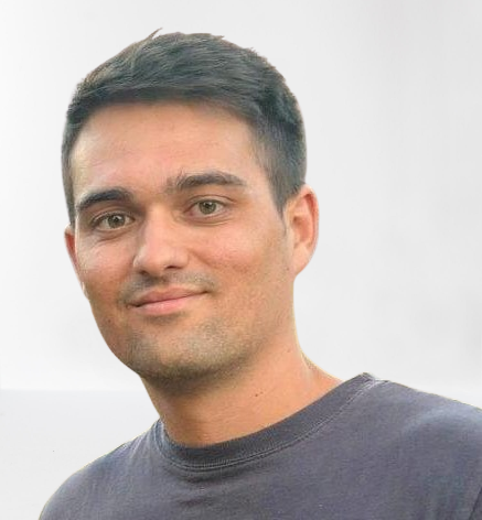 a man smiling for a picture