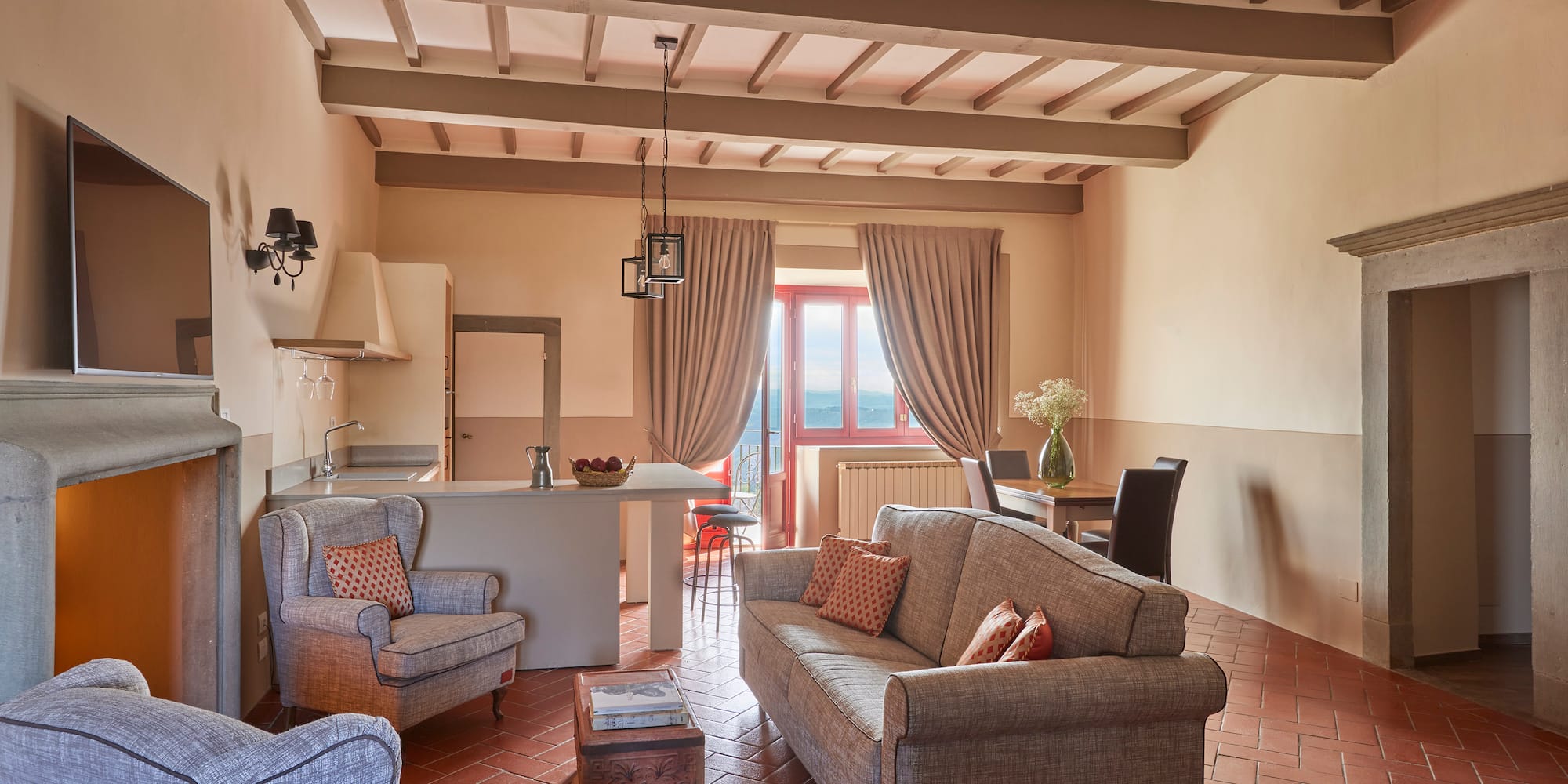 a living room with couches and chairs