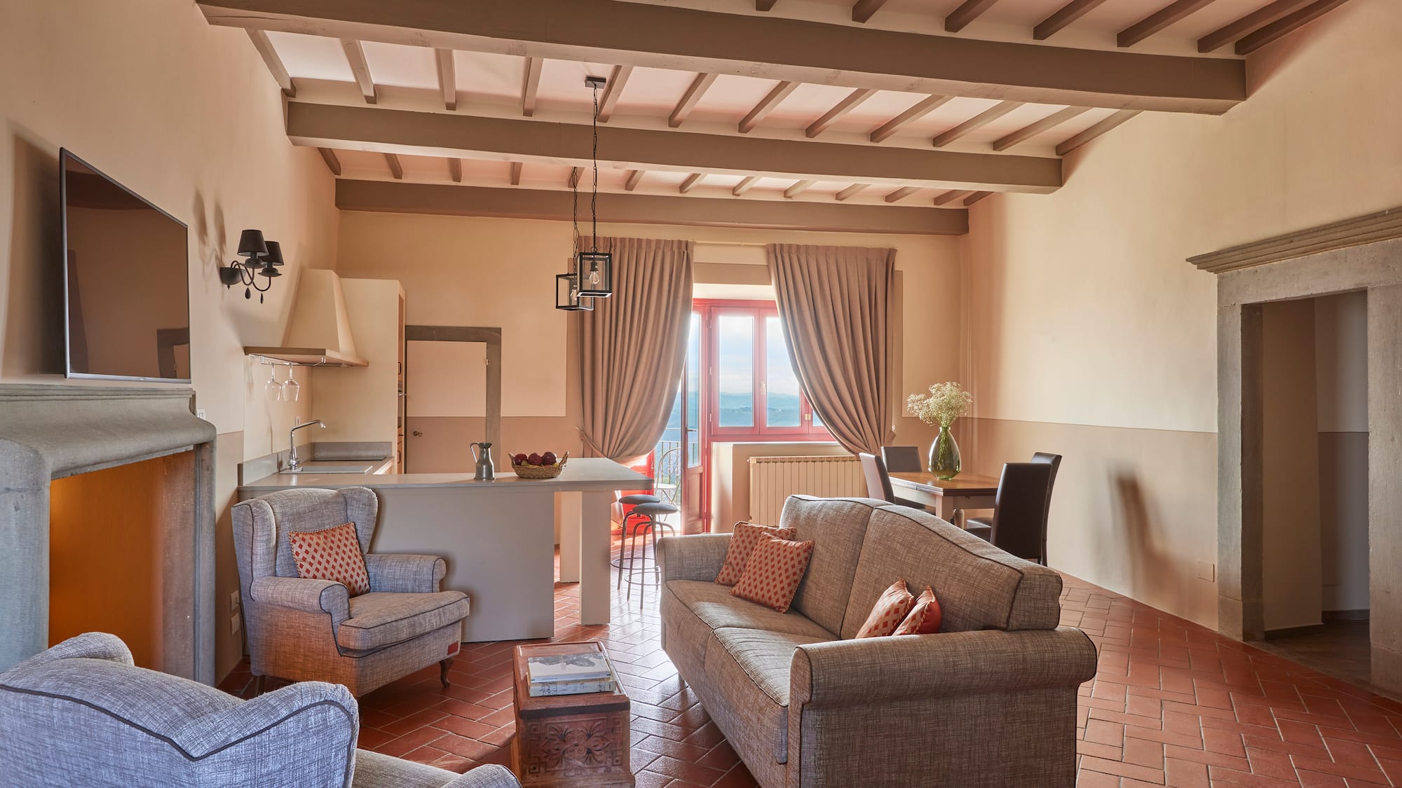 a living room with couches and chairs