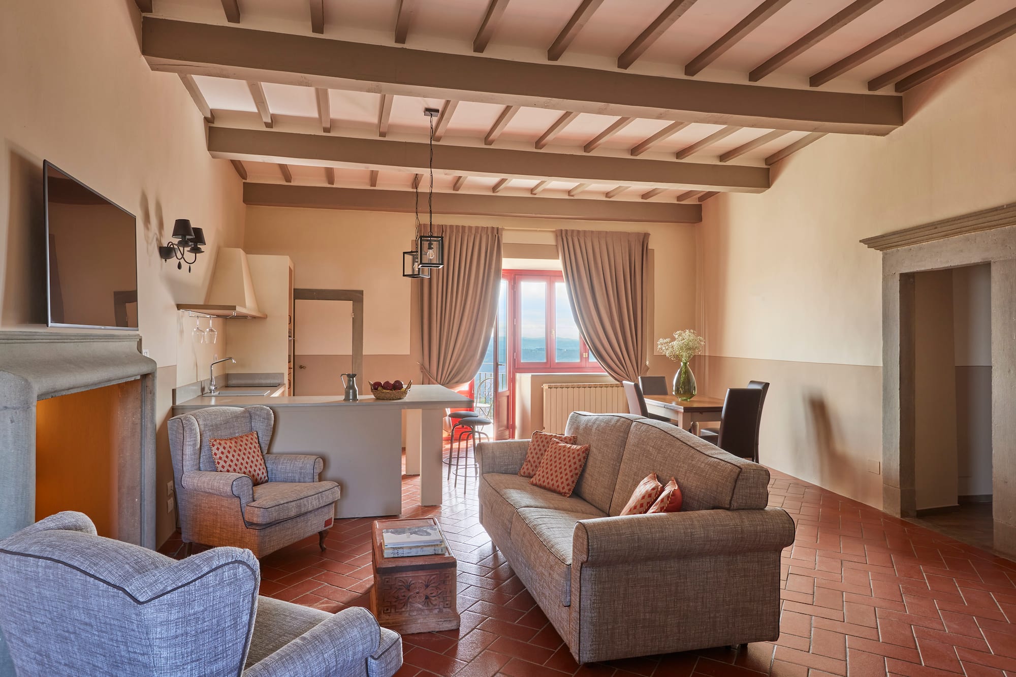 a living room with couches and chairs