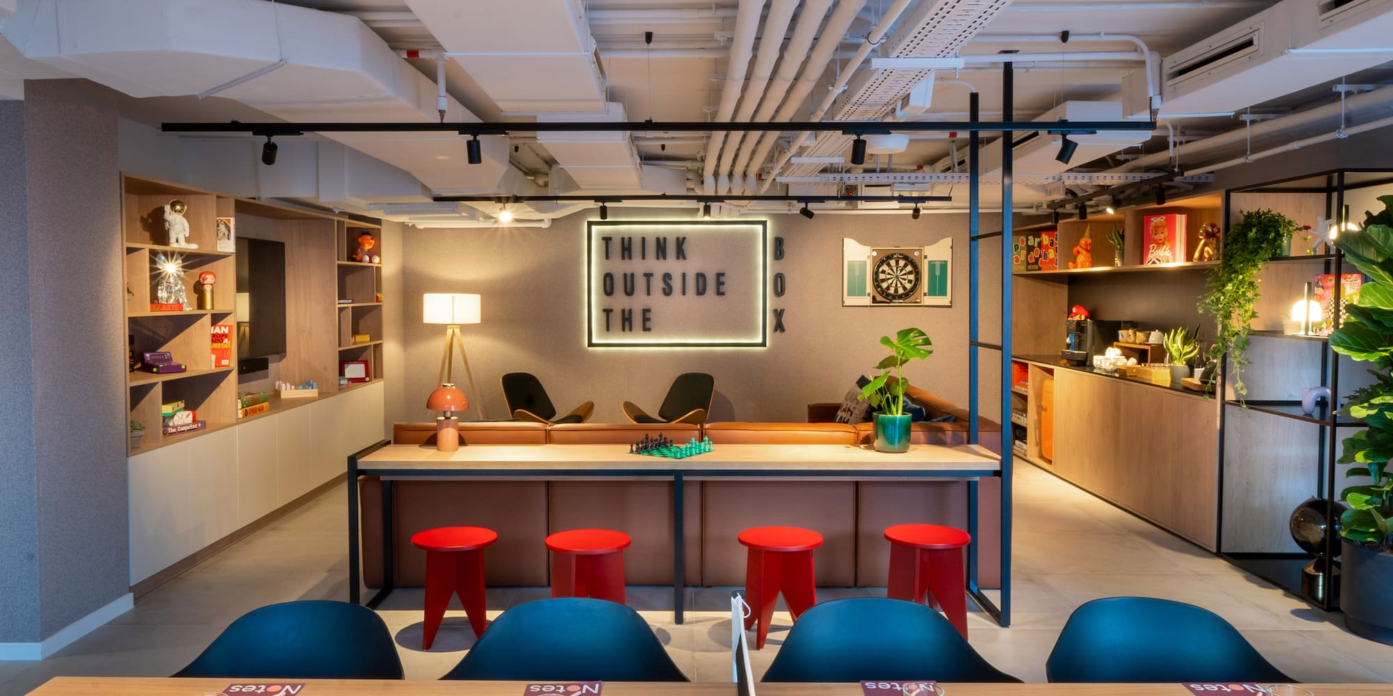 a room with tables and chairs