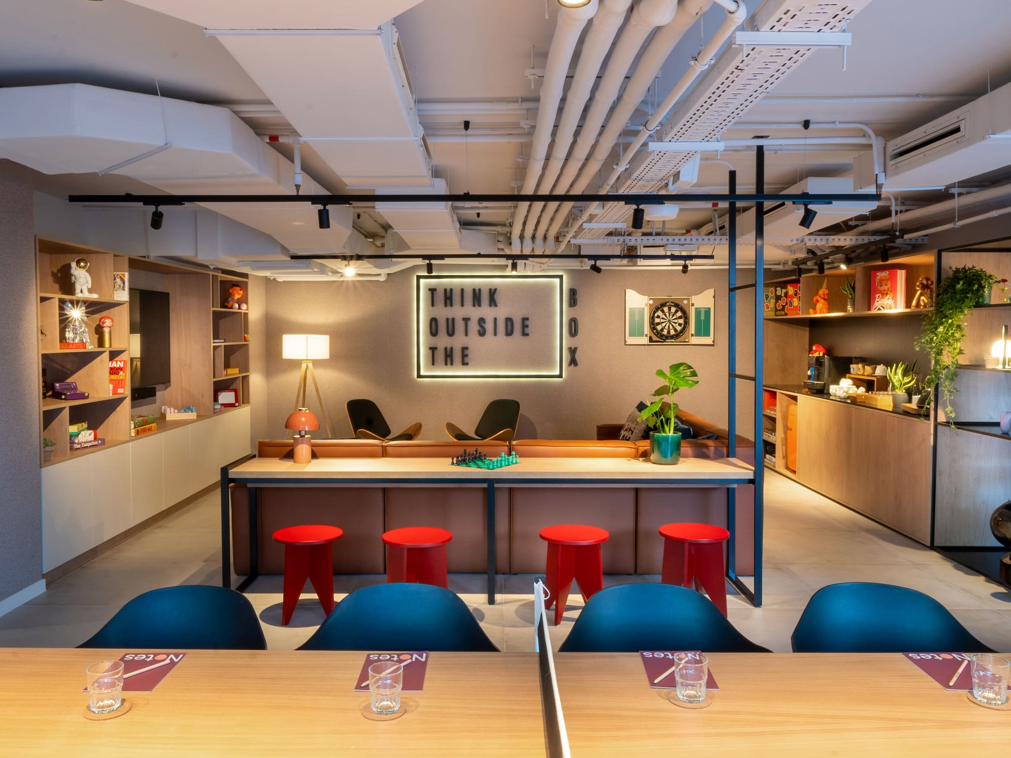 a room with tables and chairs